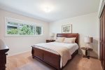 Primary Bedroom with queen bed at Sunset Cove